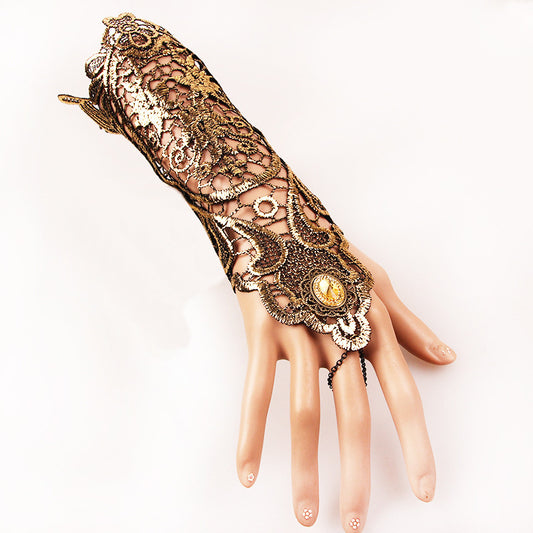 A mannequin's hand with an ornate wrist cuff showcasing Shine On! Vintage Gold Lace Gloves for Refined Retro Style by Maramalive™.