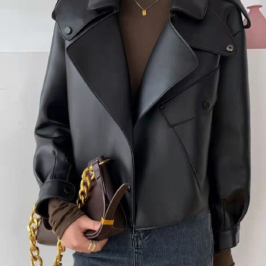 A rebellious woman in Maramalive™'s Woman's Biker Leather Jacket - Trendy Ladies Street Coat.