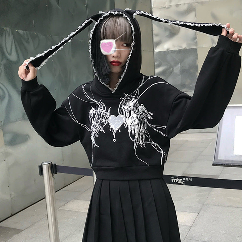 A gothic girl wearing a Maramalive™ Sports And Leisure Printing Street Hooded Top Gothic Sailor Moon Sweater.