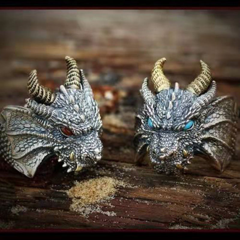 A Maramalive™ dragon ring with red eyes.