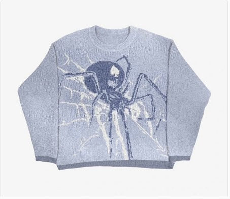 A light blue, Cozy Anime Couples: Loose Sweaters for Relaxed Duos by Maramalive™ with a large black and white spider and web design on the front.