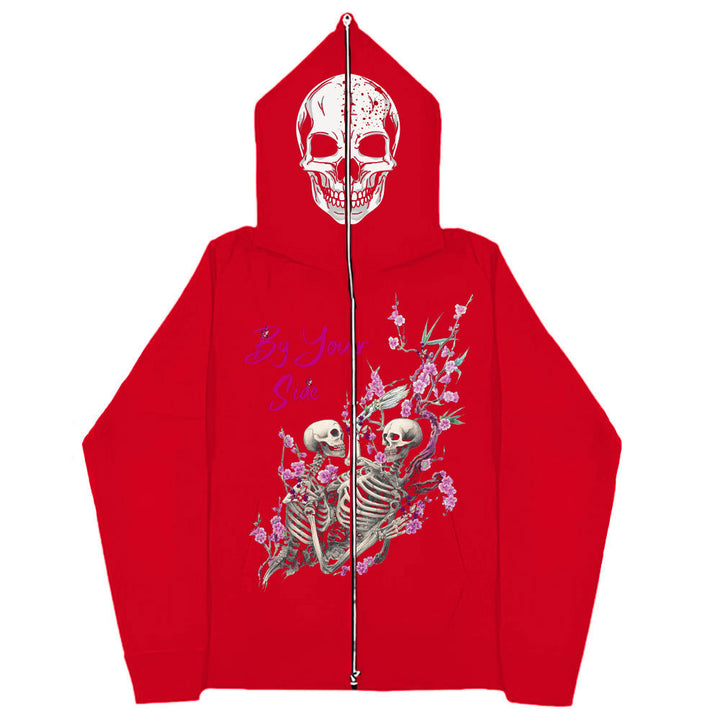 Red hoodie with a full zip, featuring a large skull graphic on the hood and two skeletons with flowers and birds on the front. Crafted from soft cotton, it blends comfort with style. Text reads "By Your Side." Gothic Couple Harajuku Black Sweatshirt Zipper Sweater by Maramalive™
