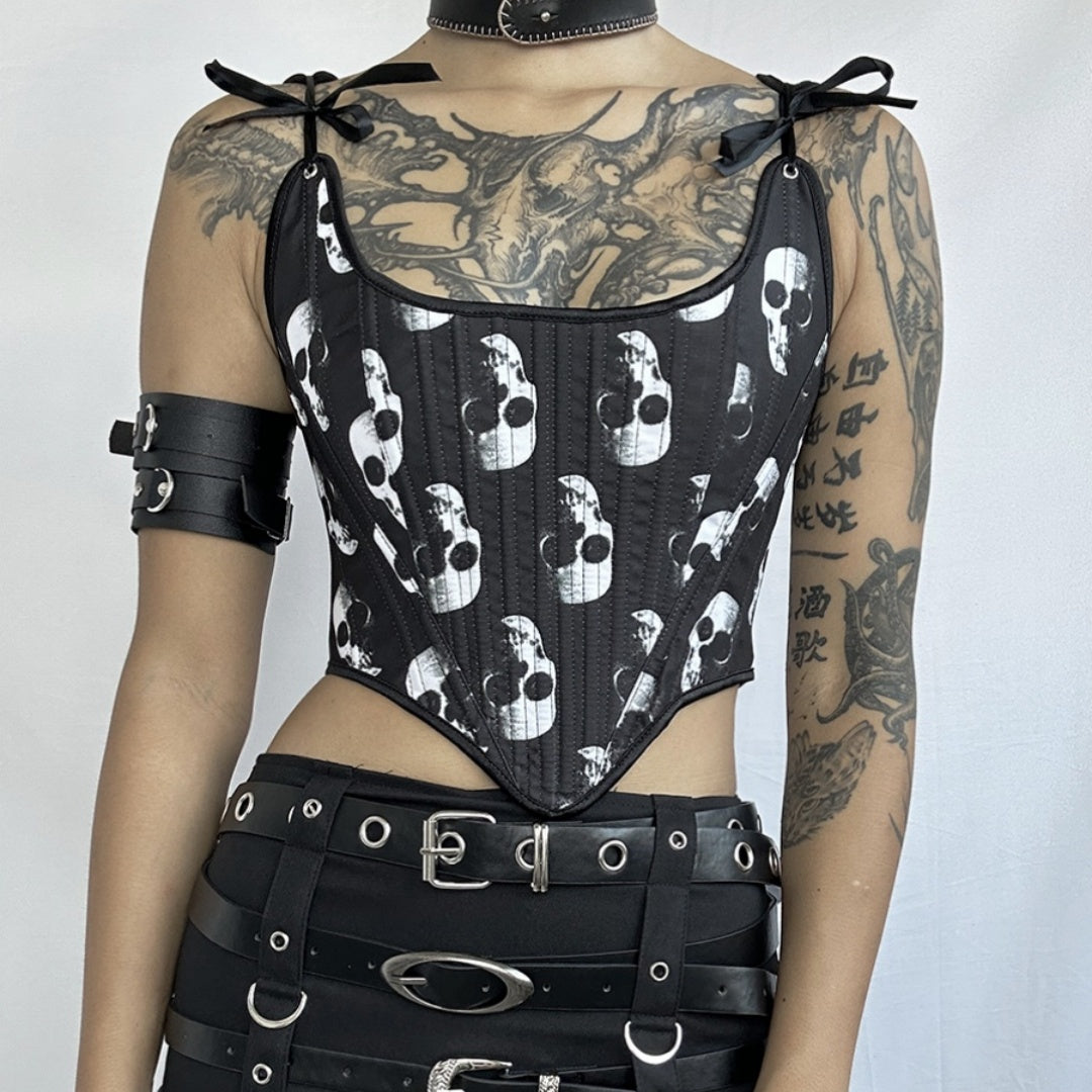Person wearing a black Maramalive™ Exclusive Dark Gothic Punk Corset tie Designs Unveiled and detailed belt, accessorized with a choker and leather armband, showcasing extensive tattoos on their arms and torso in true gothic punk fashion.