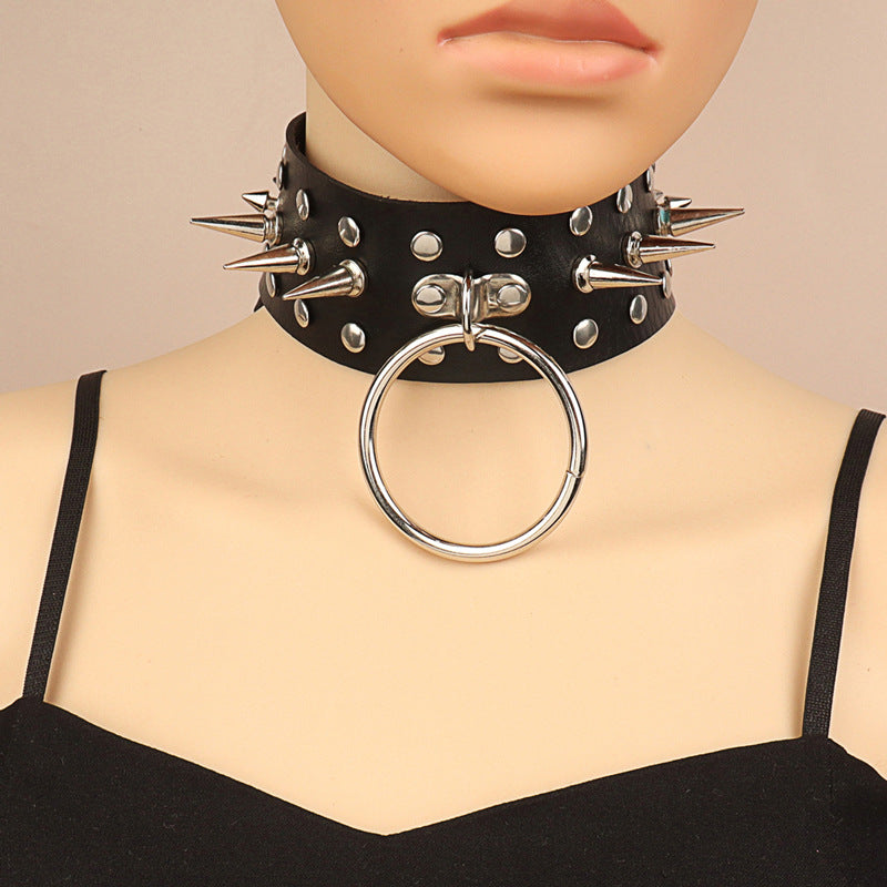 A mannequin wearing a Gothic Rivet Spike Round Ring PU Leather Collar by Maramalive™.