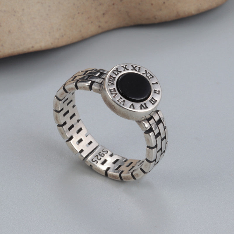 A Sterling Silver Simple Black Onyx Ring from Maramalive™ with an onyx stone on it.