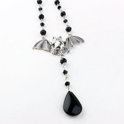A Gothic Bat Necklace with a bat on it by Maramalive™.