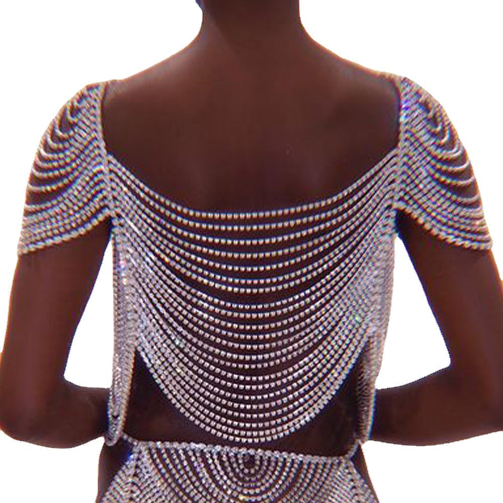 A woman in a Rhinestone Body Chain Dress Top silver  sparkling top