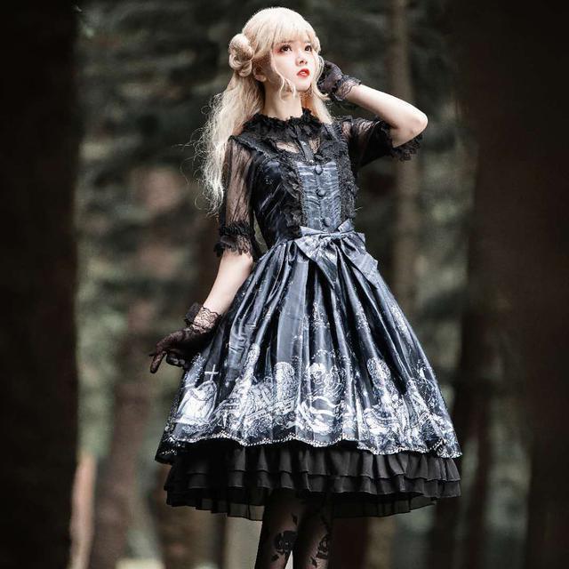 A girl in a sweet and fresh Maramalive™ Lolita JSK dress Tomb Prisoner Girl Gothic Dark Jsk Dress Dark Vintage Victorian Princess Party Dress Sleeveless lolita dress is standing in the woods.