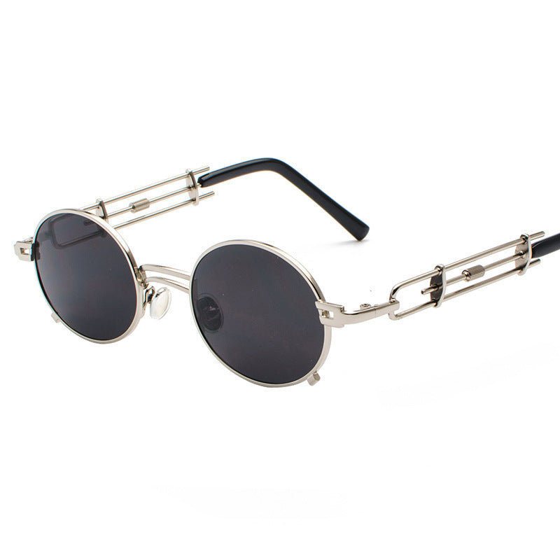 A pair of Steampunk Sunglasses by Maramalive™ with red lenses.