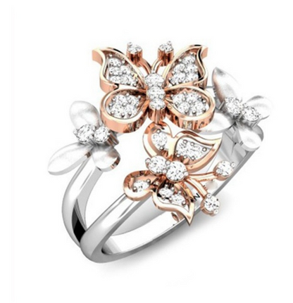 A Maramalive™ Rose Gold Butterfly Engagement Ring with Austrian Crystal and diamonds.
