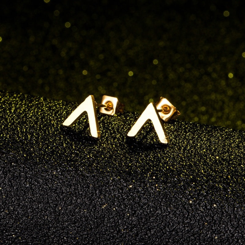 A pair of Minimalist Stainless Steel Earrings and a pair of Minimalist Stainless Steel Earrings on a black background.