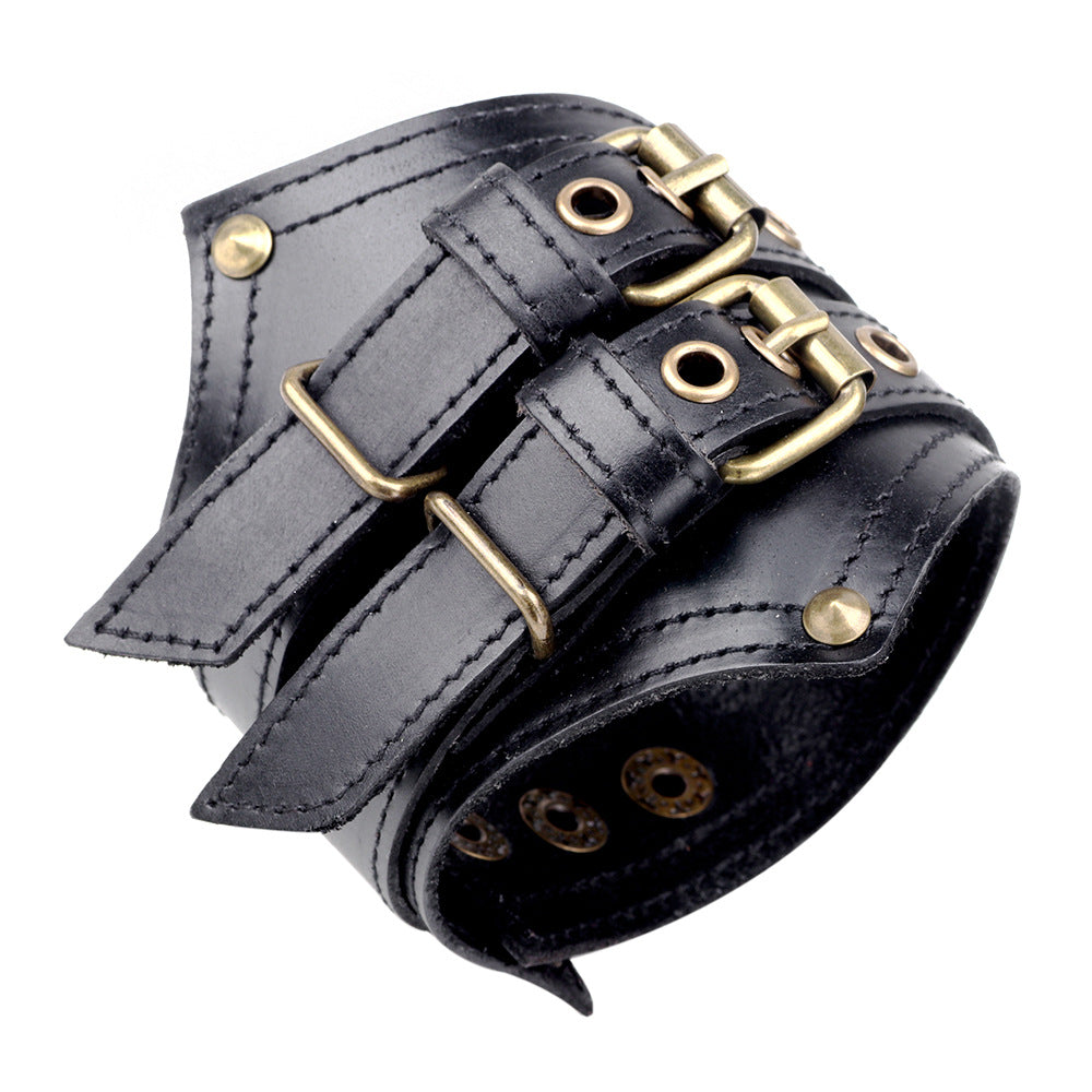 A Punk Wristband by Maramalive™, composed of red leather and featuring brass buckles.