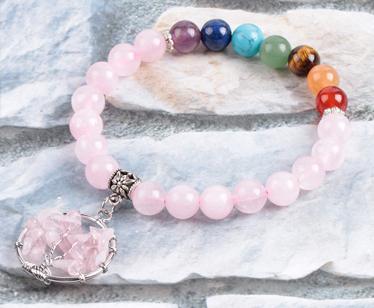 A Maramalive™ Handmade Crystal Beaded Bracelet with a tree of life charm.
