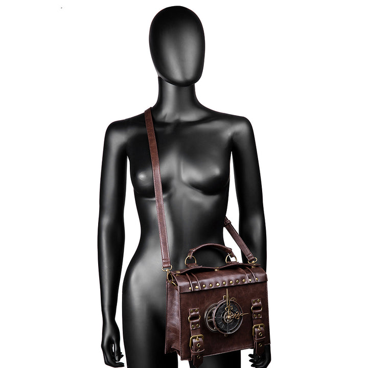 A Maramalive™ steampunk industrial retro style shoulder bag For the Steampunk Fan inside you with a clock on it.