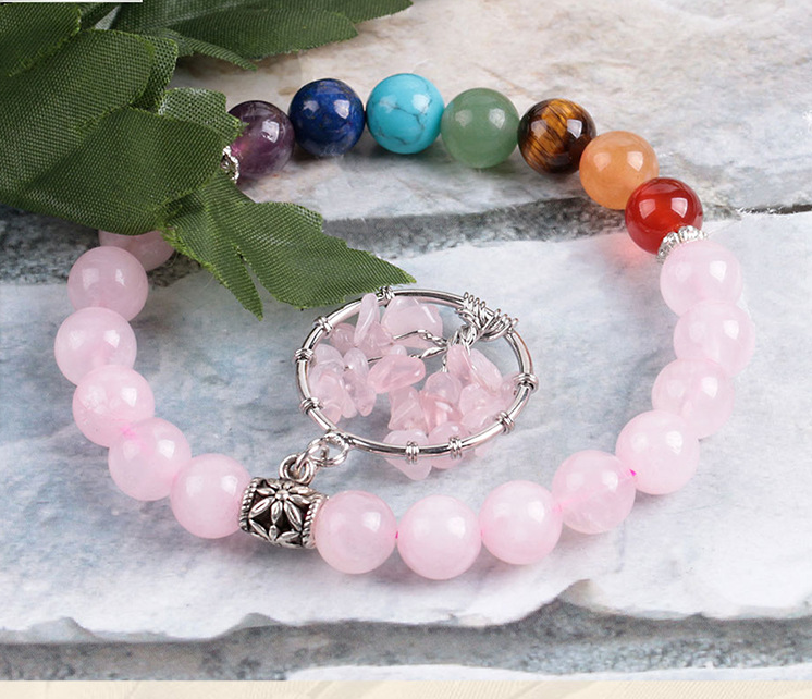 A Maramalive™ Handmade Crystal Beaded Bracelet with a tree of life charm.