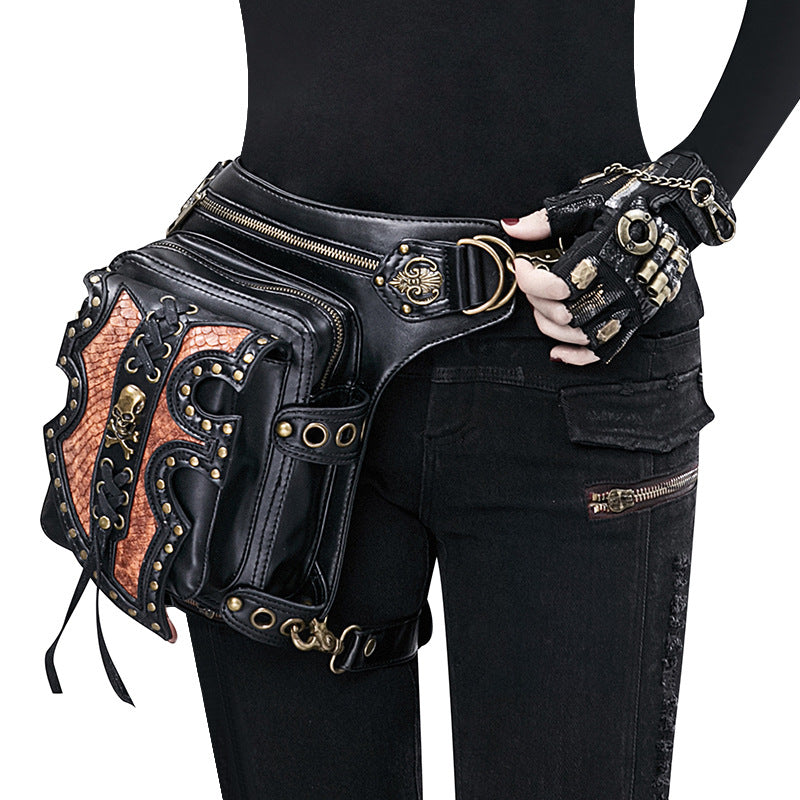 A woman is holding a Maramalive™ Steampunk Motorcycle Bag, a black and gold fanny pack, multiple-use bag for the adventurer.