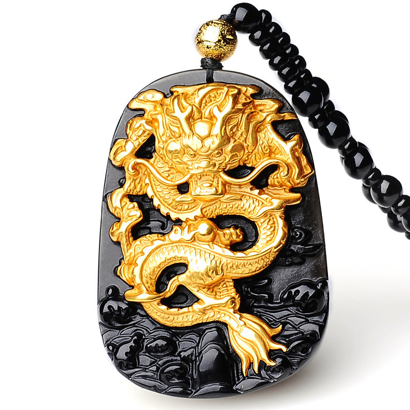 A black and gold Golden Dragon Pendant Necklace with a dragon on it, by Maramalive™.