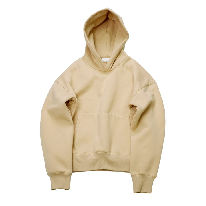 A beige Hoodie Hoodie by Maramalive™ with long sleeves and a front pouch pocket is showcased against a white background. For accurate fitting, please refer to the size chart provided.