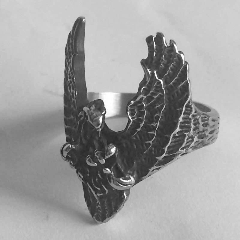 An vintage-inspired Maramalive™ Wings of Destiny eagle ring with talon-tastic details, making a statement on a person's finger.