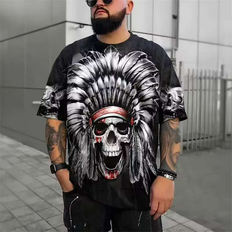 A bearded man with sunglasses is wearing a Maramalive™ 3D Printed Men's Crew Neck Casual T-shirt adorned with a large digital print of a skull wearing a feathered headdress. He is standing in an urban setting with a concrete building and a fence in the background.