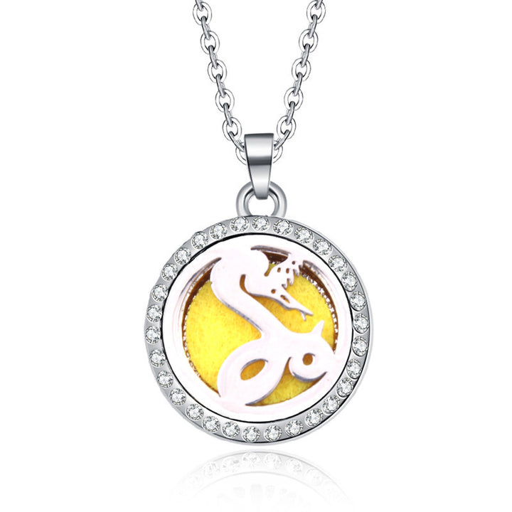 A silver box with five Maramalive™ Women's Aromatherapy Oil Round Necklaces in it.