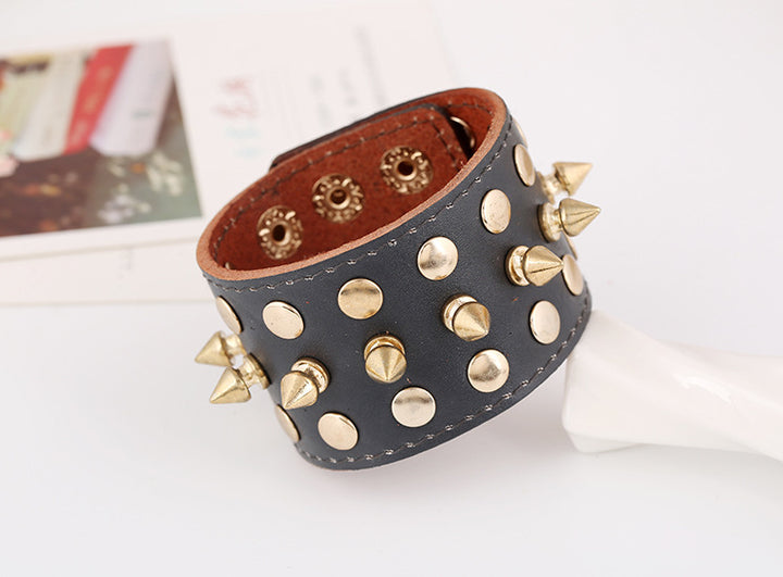 An edgy Rock punk leather bracelet with spikes, perfect for those embracing European and American fashion vibes. (Brand Name: Maramalive™)