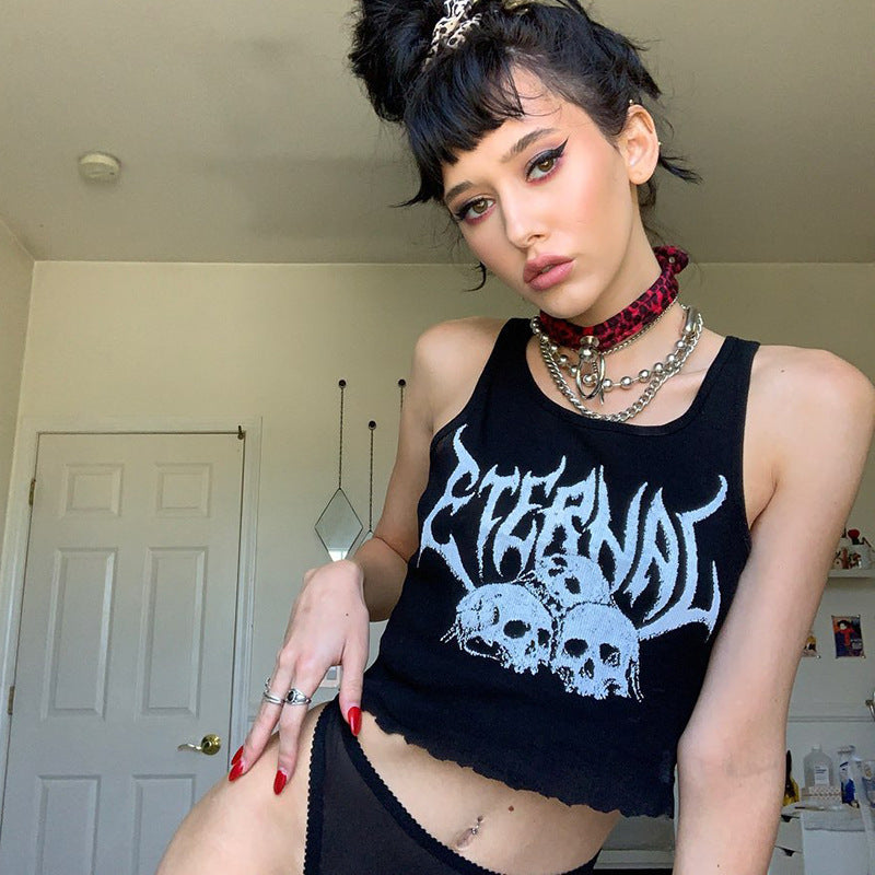 A gothic woman wearing a black crop top with skull motifs, the Mortal Mesh: Navel Cropped Short Vest Female Gothic Style Vest Skull Print Top from Maramalive™.