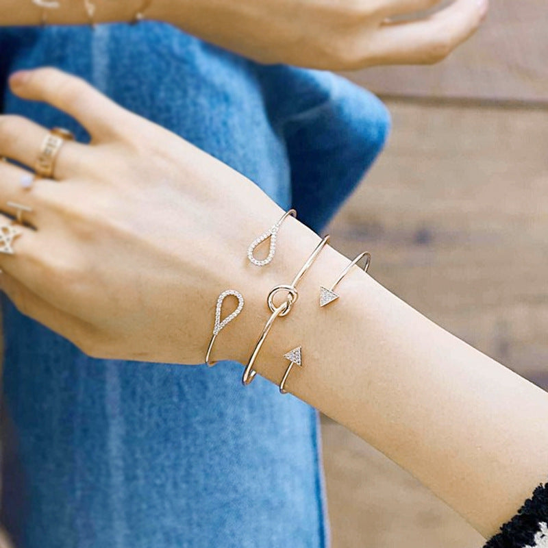 A woman's wrist with three Maramalive™ bracelets on it.