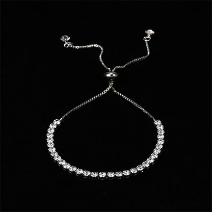 A Crystal Rhinestone Bangle Bracelet for Women - Elegant Wedding or Party Gift by Maramalive™ with diamonds on a black background.