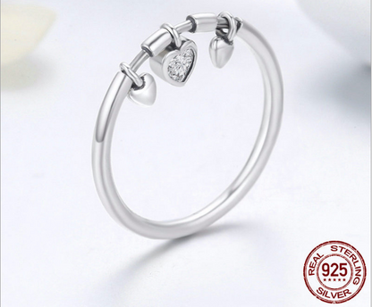A 925 Silver Ring with Charms from Maramalive™, with two heart charms.