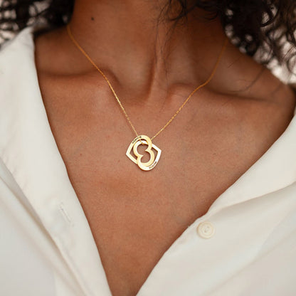 An image of a woman wearing a Maramalive™ Personalized Name Stainless Steel DIY Necklace Jewelry with an infinity symbol.