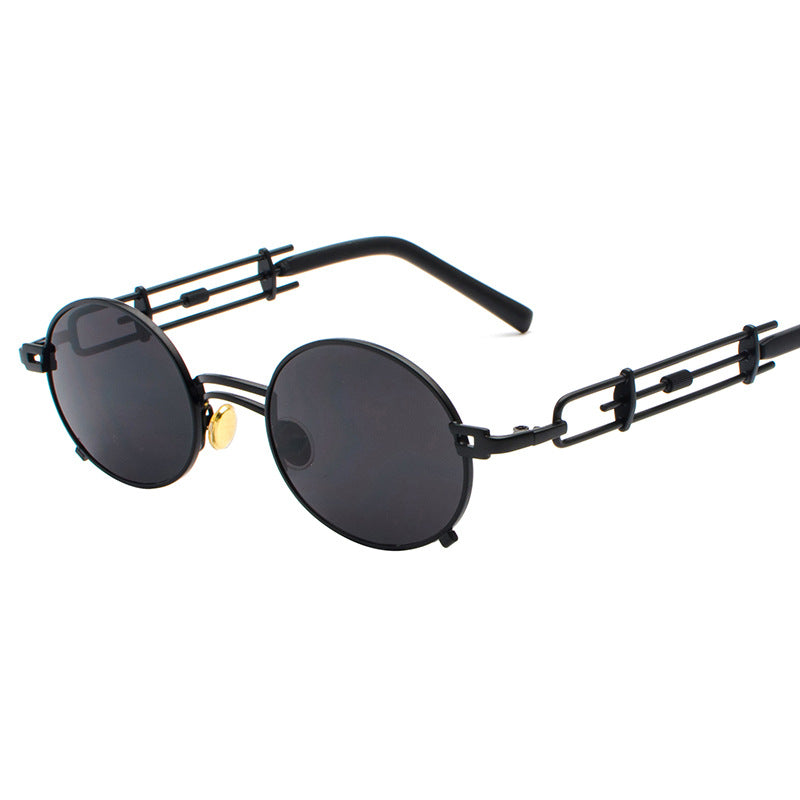 A pair of Steampunk Sunglasses by Maramalive™ with red lenses.