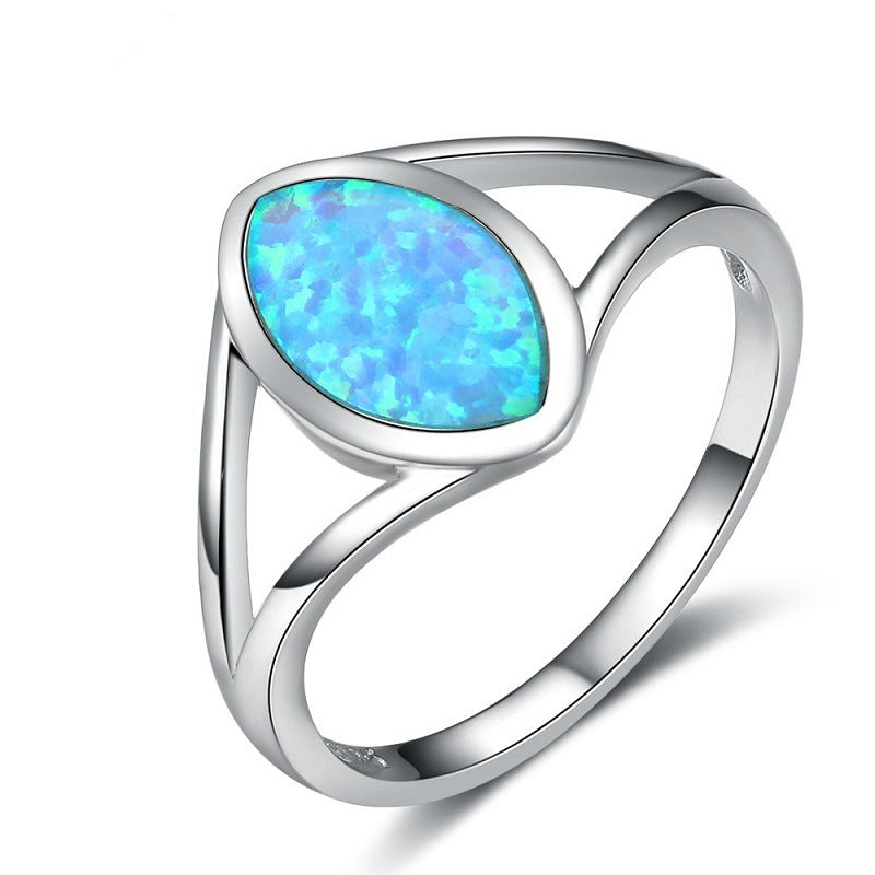 A Maramalive™ vintage oval ring with a blue opal stone electroplated.
