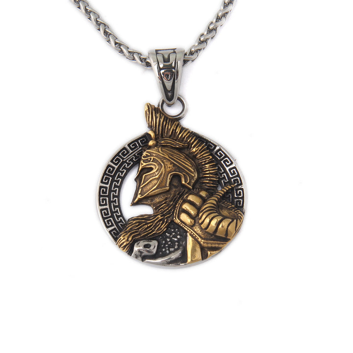 A hand holding a Viking Valor Pendant necklace by Maramalive™.