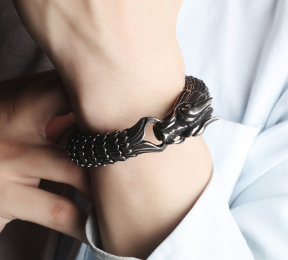 A woman wearing a Maramalive™ Zodiac Dragon Bracelet.