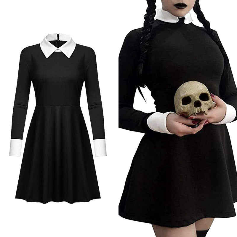 A woman in a Halloween Wednesday Black Dress Cosplay by Maramalive™ holding a skull.