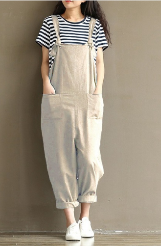 A woman wearing blue Hippie Casual Cotton Overalls and a white t-shirt, with a waist measurement of cm.