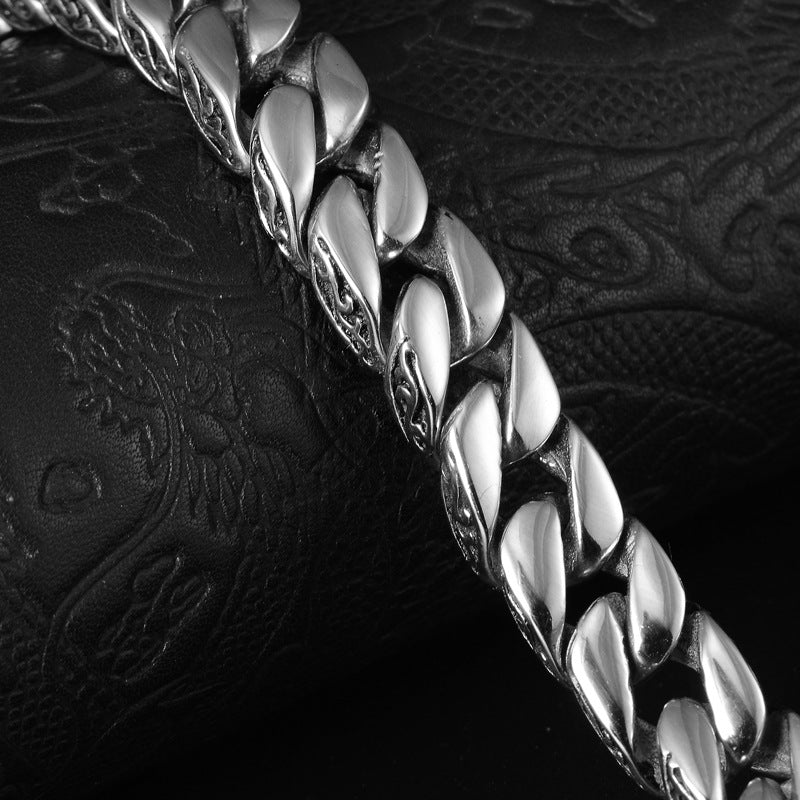 A Maramalive™ Fashion Men Titanium Steel Bracelet Lace Totem Titanium Steel Bracelet with a clasp.