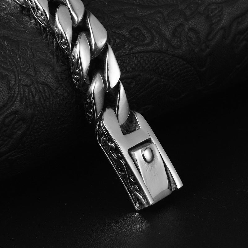 A Maramalive™ Fashion Men Titanium Steel Bracelet Lace Totem Titanium Steel Bracelet with a clasp.