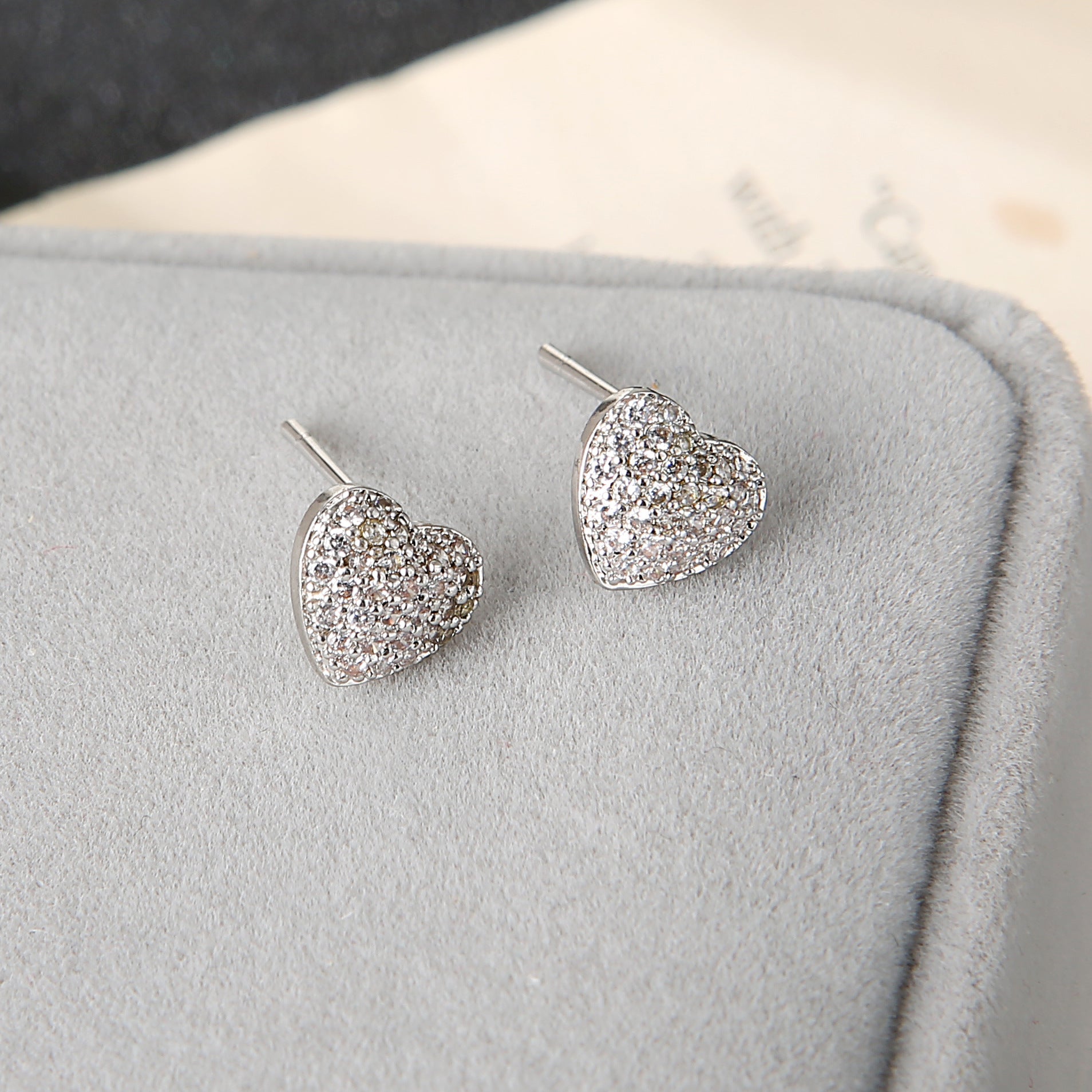 A pair of Maramalive™ Love Stud Earrings on a white background.