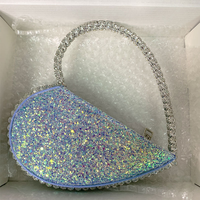 Diamond studded dinner bag with diamond heart-shaped clutch