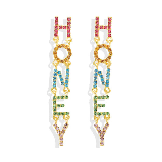 A pair of Maramalive™ Diamond Long Earrings with the word honey on them.