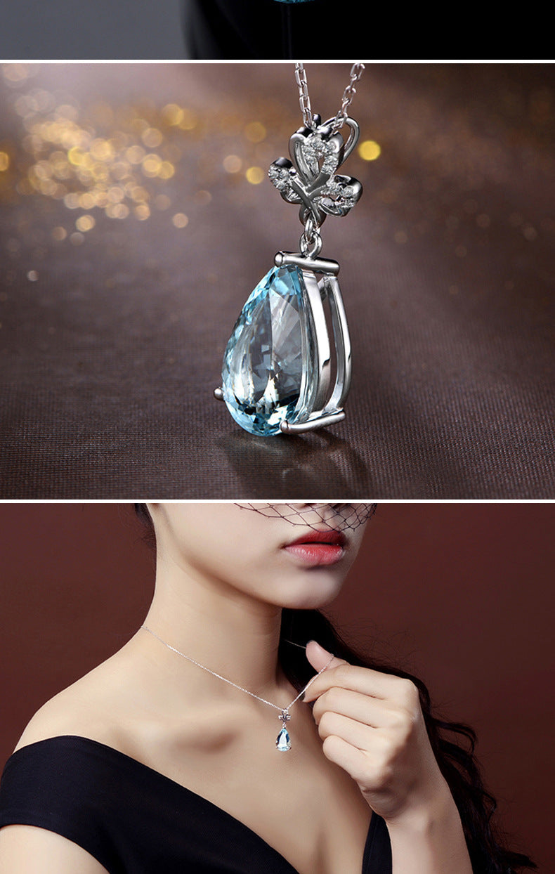 A Maramalive™ sterling silver necklace with a Sky Blue Topaz Crystal and diamonds.