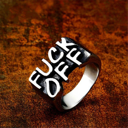 A person wearing a Fashion Retro Gothic Punk Ring from Maramalive™ with the word 'fuck off' on it.