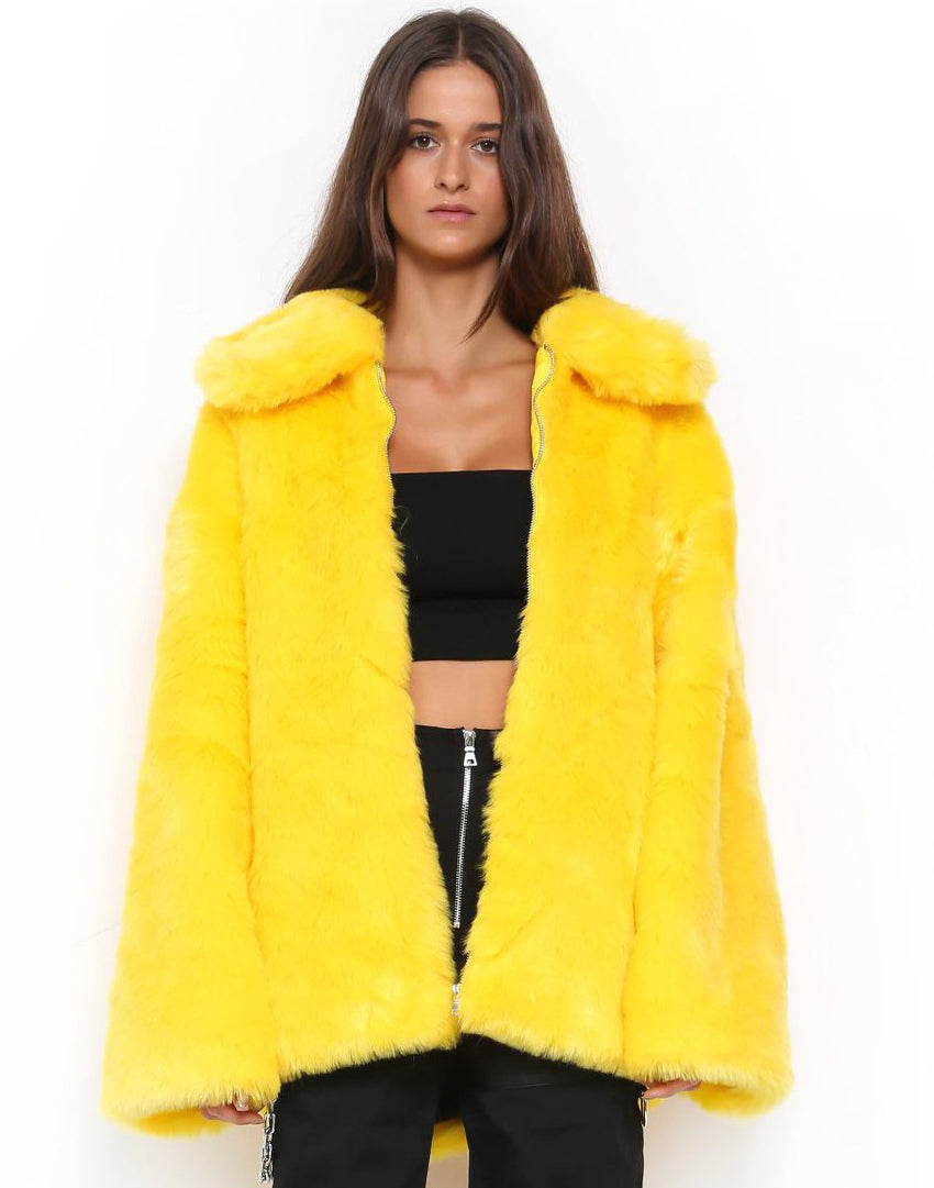 A woman flaunting a medium-length, yellow Maramalive™ Bright Yellow Plunk Faux Fur Coat - Cool Fake Fur Jacket