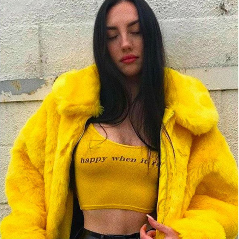 A woman flaunting a medium-length, yellow Maramalive™ Bright Yellow Plunk Faux Fur Coat - Cool Fake Fur Jacket