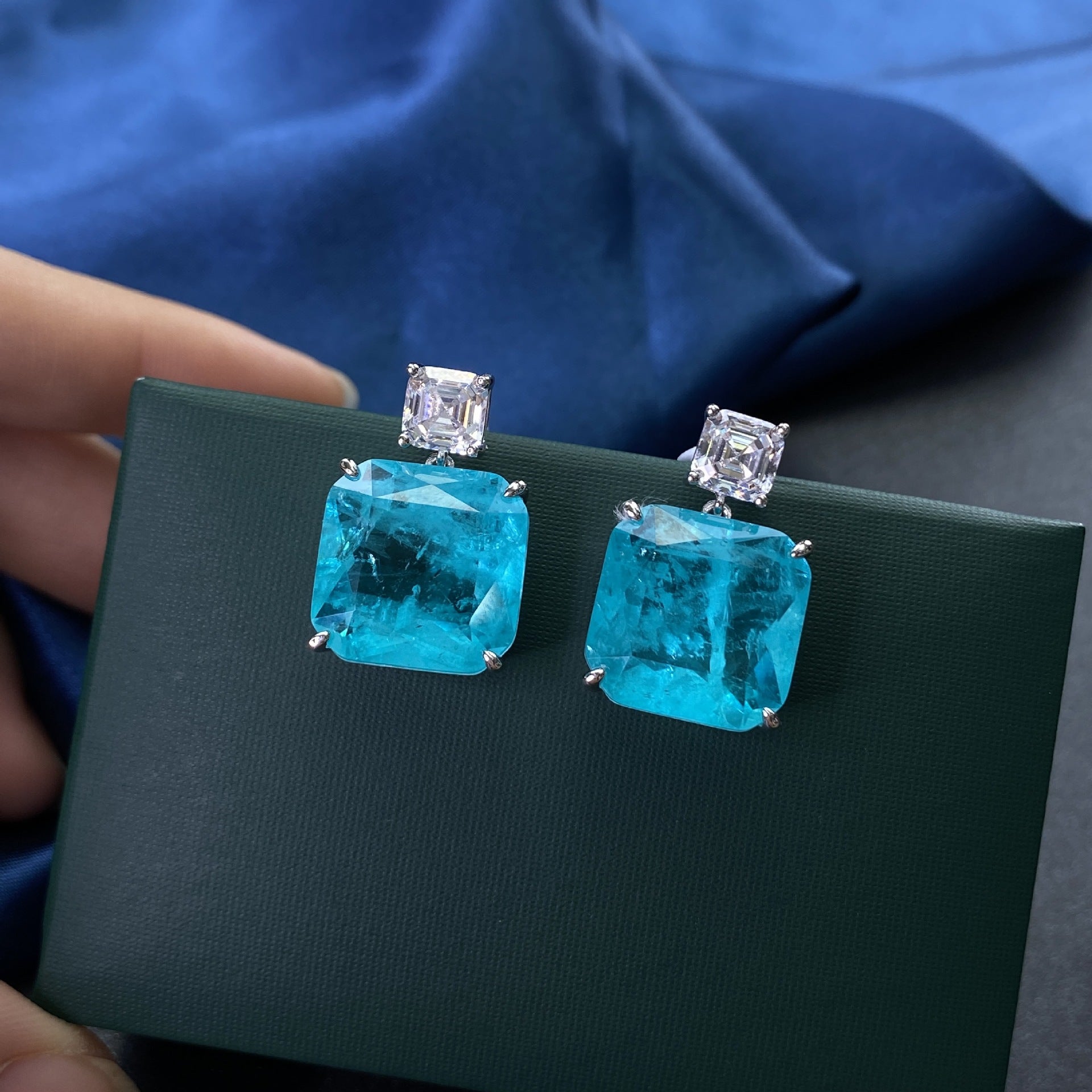 A pair of Blue Paraiba Earrings - 925 Sterling Silver in a Maramalive™ gift box.