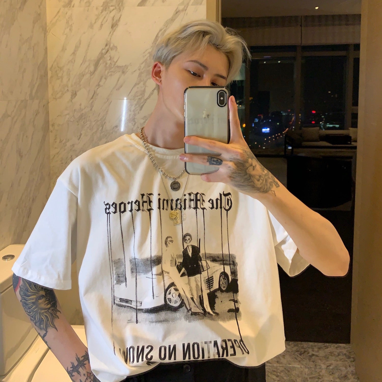 A woman taking a summer selfie in a Maramalive™ Short Sleeved Summer Korean Version T-Shirt For Men Dark Gothic Style.