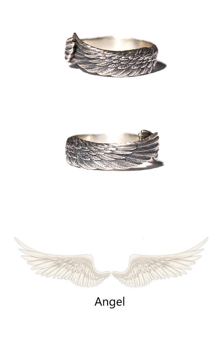 A Retro Angel Wings Ring with a pair of wings on it from Maramalive™.