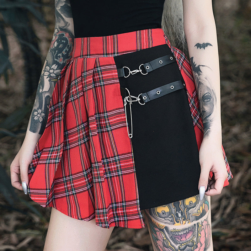 A woman with tattoos wearing a Maramalive™ Gothic Pleated Short Skirt.